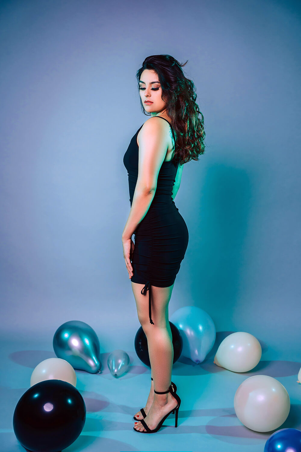 Professional female fashion model photographed in studio